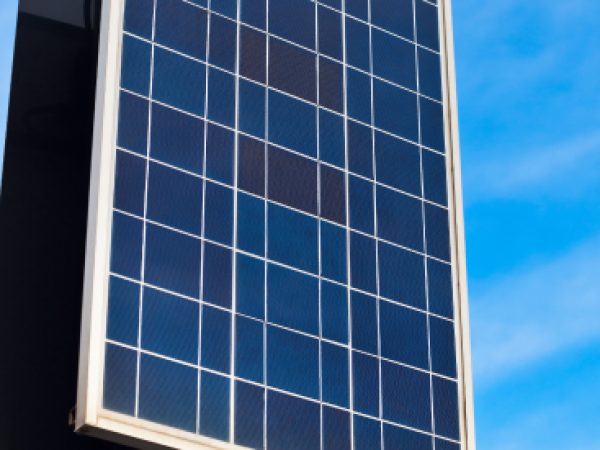 solar-panels-on-bright-blue-sky-background-renewa-2022-02-02-05-42-09-utc-1.jpg